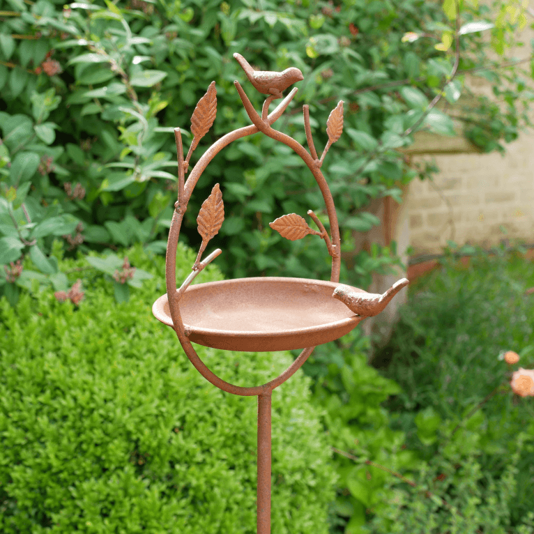 Rustic Metal Bird Feeder on a Stake with Leaves and Birds Detail