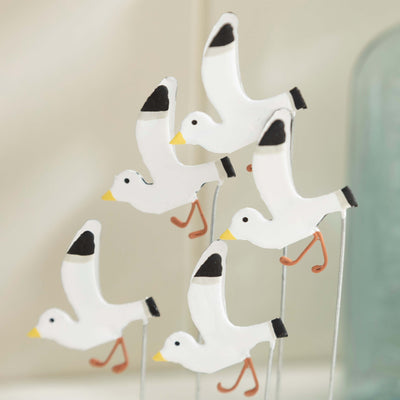 Flock of Seagulls Swooping for Chips – Coastal-Inspired Figurine Display