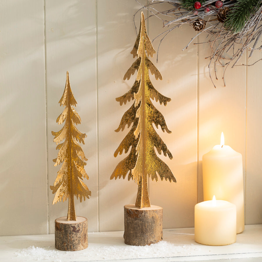 Metal Christmas Tree Ornament with Gold Finish on a Wooden Base