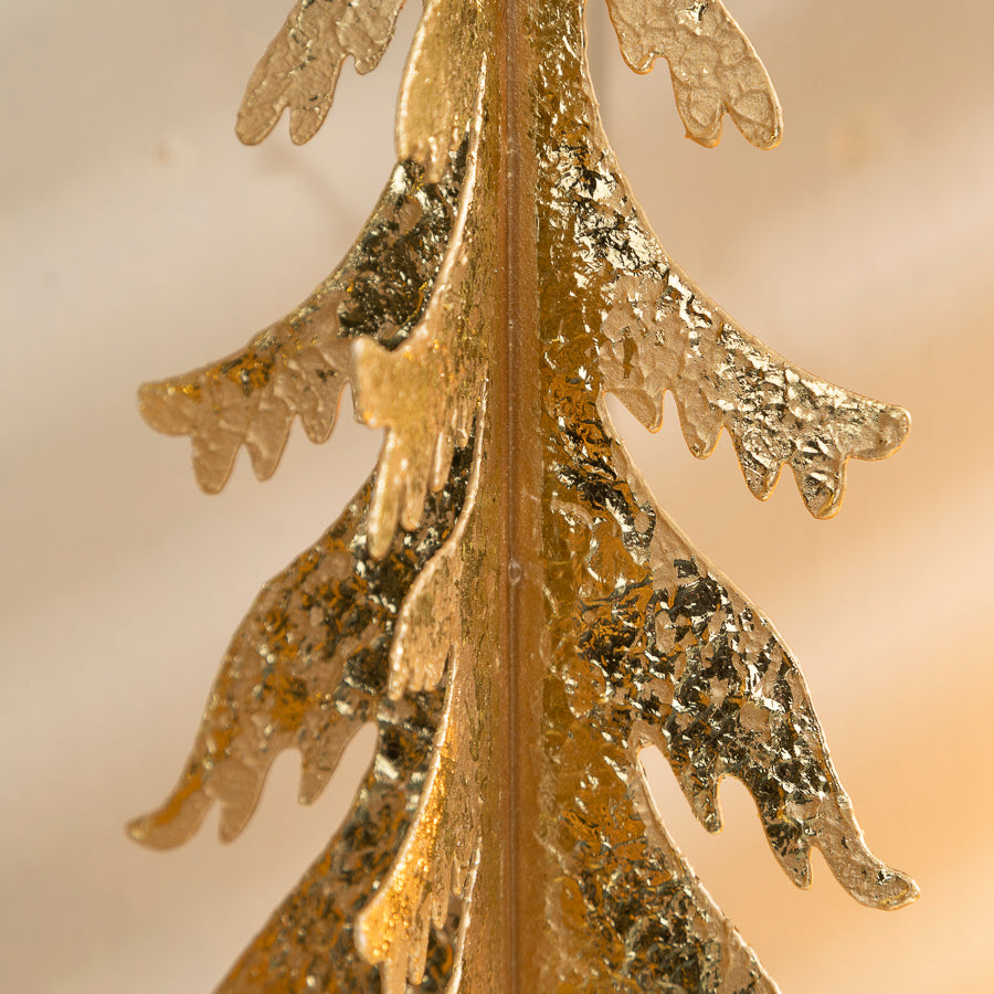 Metal Christmas Tree Ornament with Gold Finish on a Wooden Base