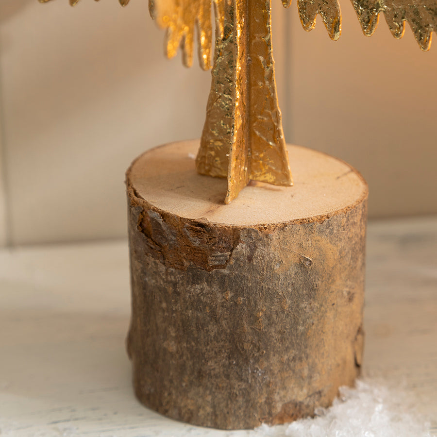 Metal Christmas Tree Ornament with Gold Finish on a Wooden Base